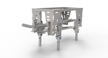 Metal table with a white background and a machine on top of it