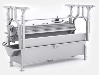 White-colored machine sitting on top of a table, which is used to make a sheet of paper