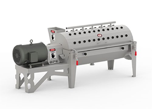 Machine sitting on top of a table with a motor and a white background